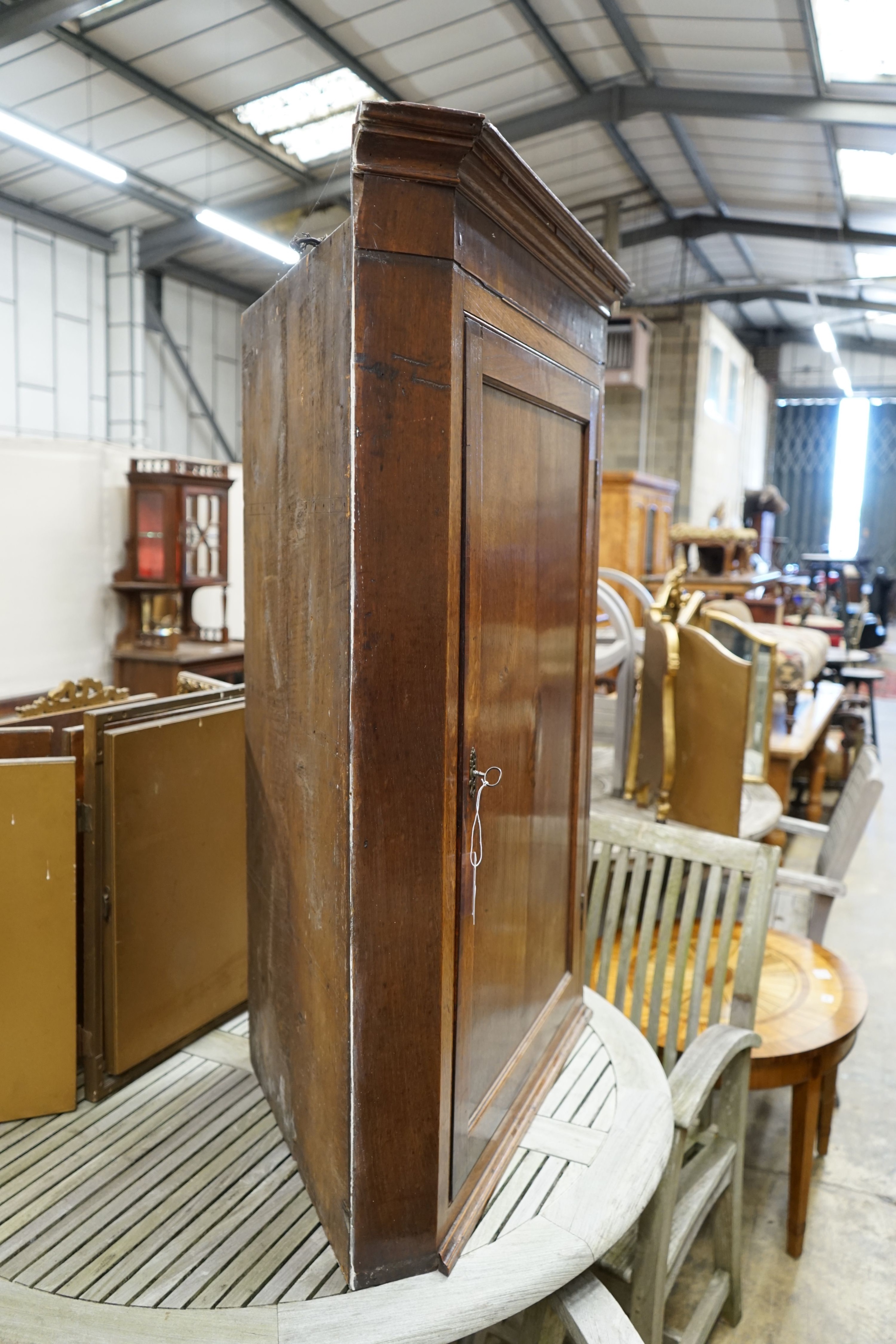 A George III mahogany banded oak hanging corner cabinet, width 82cm, depth 42cm, height 116cm